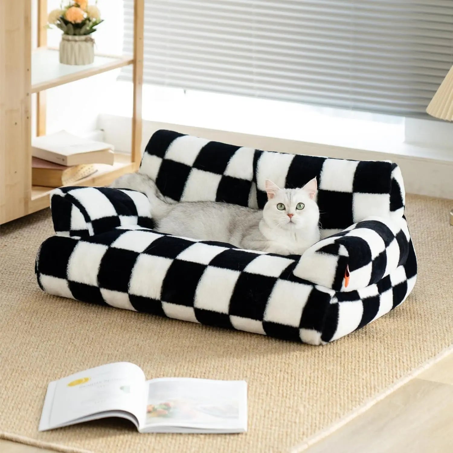 Black and white Mewoofun pet couch bed with a fluffy cat, washable and suitable for medium and small dogs and cats up to 25 lbs.