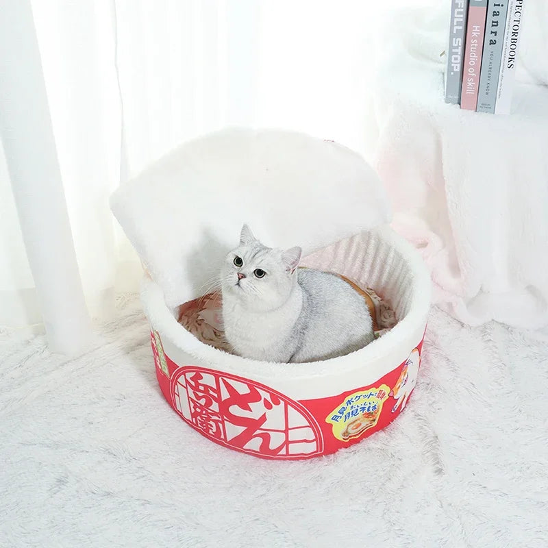 Noodle-shaped pet bed with fleece lining, suitable for cats and small dogs, featuring a breathable design and detachable cover.